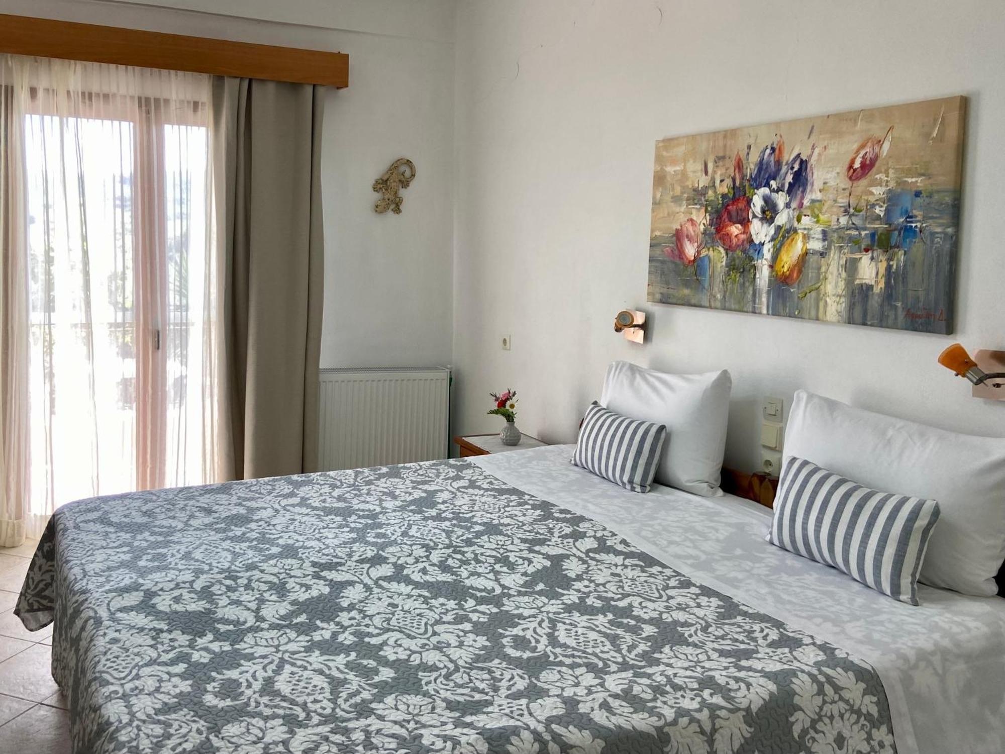 Floros Apartments Агиос Стефанос Экстерьер фото