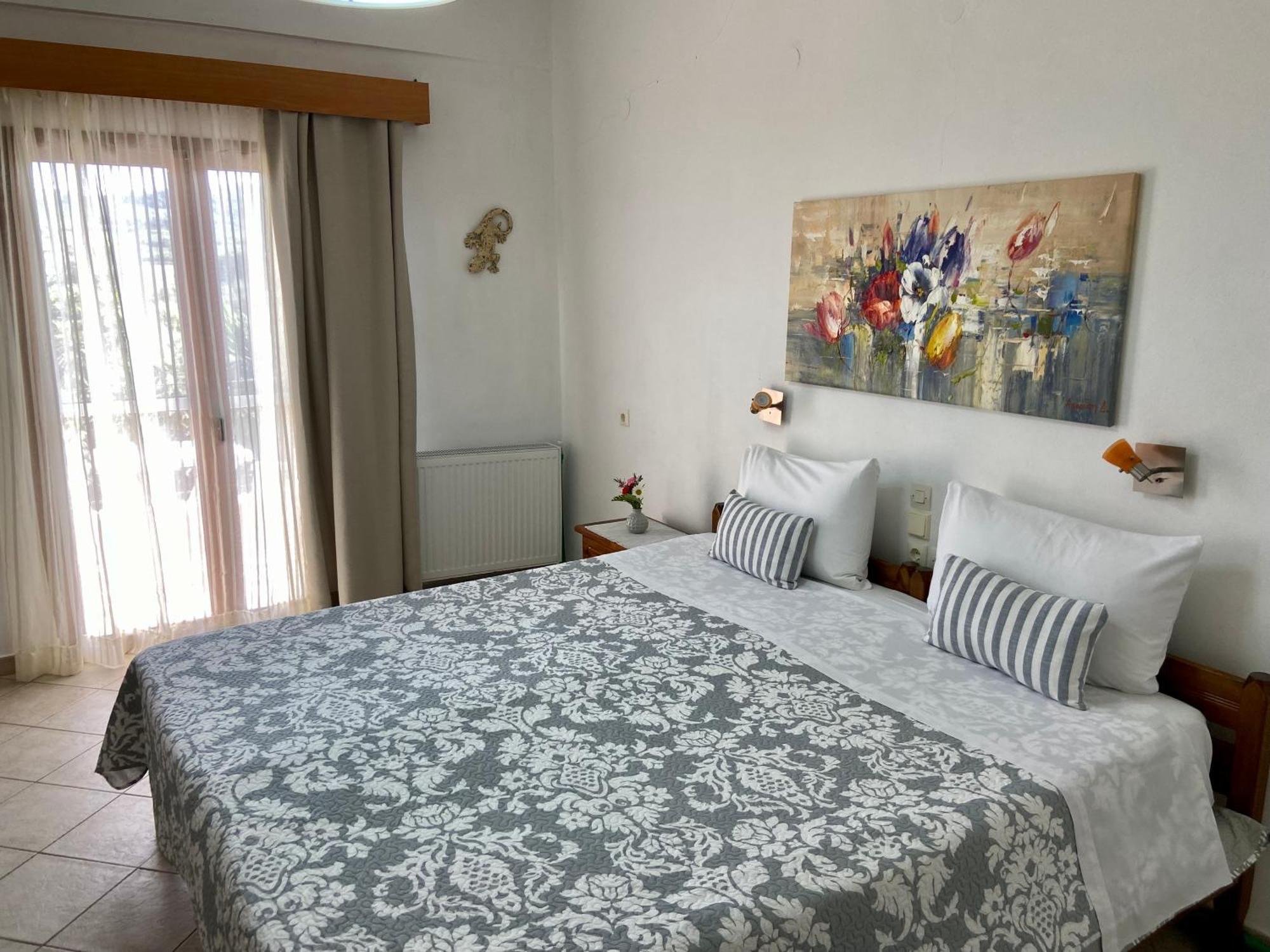 Floros Apartments Агиос Стефанос Экстерьер фото