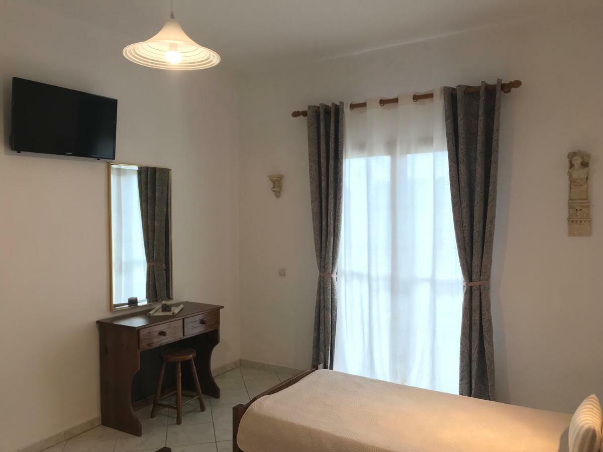 Floros Apartments Агиос Стефанос Экстерьер фото